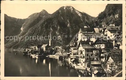 Hallstatt Salzkammergut Ortsansicht mit Kirche Hallstaetter See Hirlatz Dachsteingebirge Kat. Hallstatt