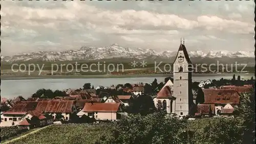 Hagnau Bodensee Ortsansicht mit Kirche Schweizer Alpen Kat. Hagnau am Bodensee