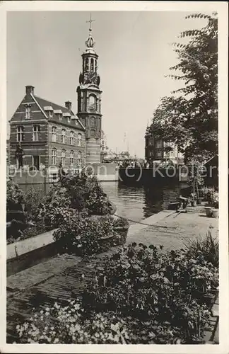 Amsterdam Niederlande Singel Bloemenmarkt met Munttoren Kat. Amsterdam