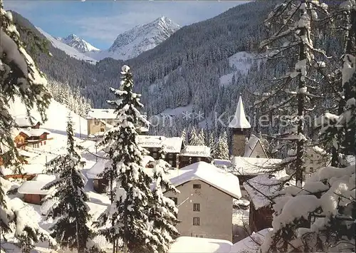 Langwies GR Dorfpartie mit Kuepfenfluh und Strelapass Kat. Langwies