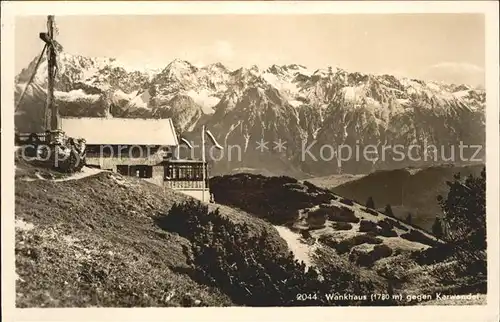 Partenkirchen Wankhaus Berghuette Kreuz gegen Karwendel Kat. Garmisch Partenkirchen