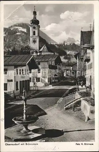 Oberaudorf Dorfpartie mit Bruennstein Kat. Oberaudorf