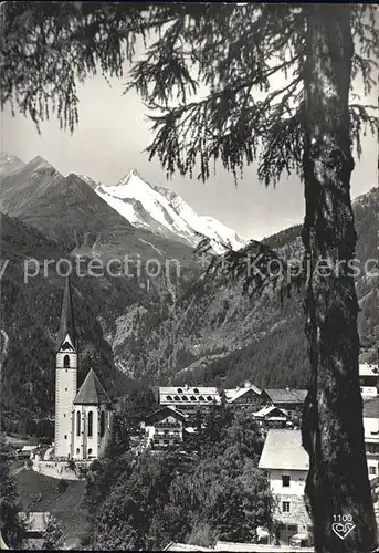 Heiligenblut Kaernten Ortsansicht mit Kirche und Grossglockner Hohe Tauern Hochalpenstrasse Kat. Heiligenblut