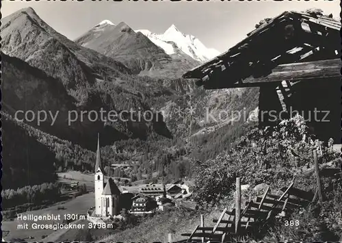 Heiligenblut Kaernten Ortsansicht mit Kirche und Grossglockner Hohe Tauern Berghuette Kat. Heiligenblut