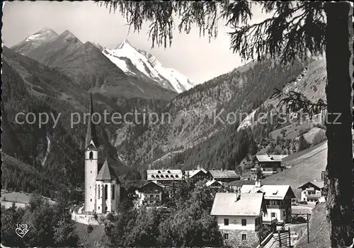 Heiligenblut Kaernten Ortsansicht mit Kirche und Grossglockner Hohe Tauern Hochalpenstrasse Kat. Heiligenblut