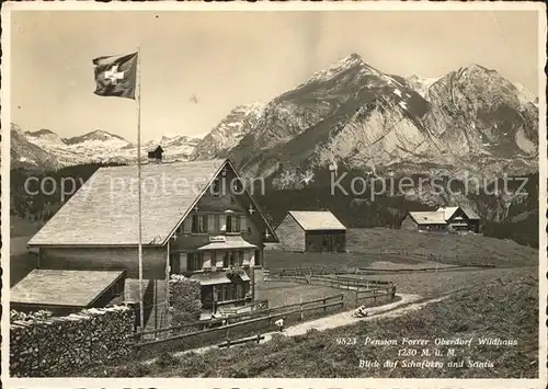 Wildhaus SG Pension Forrer Blick auf Schafberg und Saentis Appenzeller Alpen Schweizer Flagge