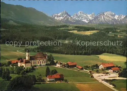 Wies Allgaeu Wallfahrtskirche zum gegeisselten Heiland Fliegeraufnahme mit Tiroler und Allgaeuer Alpen Fliegeraufnahme Kat. Sulzberg