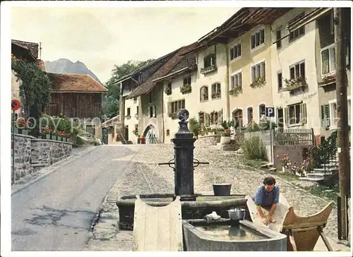 Greyerz Dorfmotiv Brunnen Kat. Gruyeres