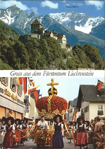 Vaduz Schloss mit Falknis Raetikon Festumzug Fuerstenkrone Liechtensteiner Tracht Kat. Vaduz