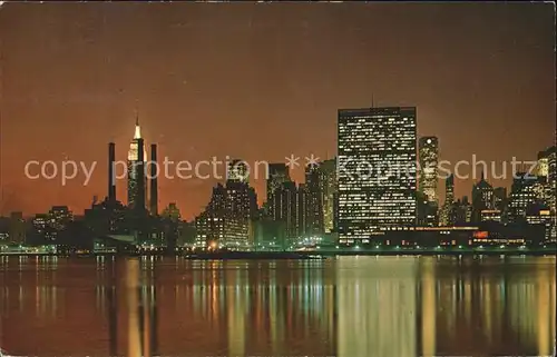 New York City United Nations Headquarter and Empire State Building at night / New York /