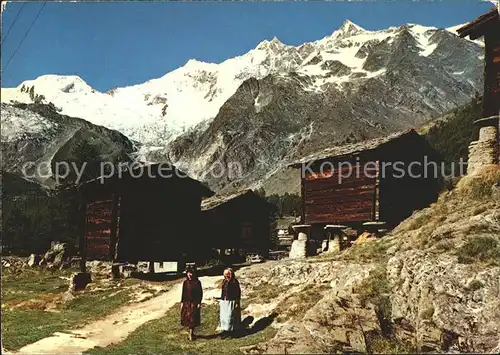 Saas Fee Dorfmotiv Frauen ins Saasertracht Alphubel T?schhorn Kat. Saas Fee