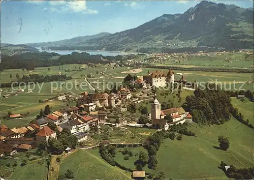 Gruyeres FR Au fond Broc et lac de la Gruyere Kat. Gruyeres