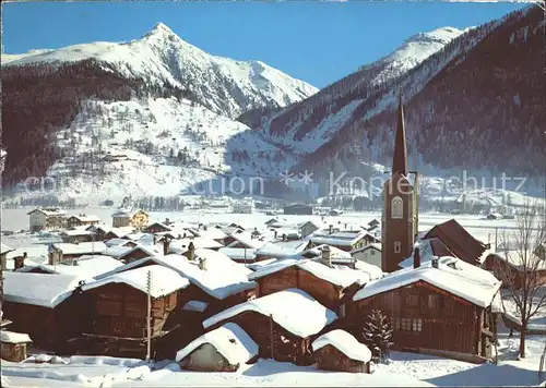 Ulrichen Dorfpartie mit Kirche und Nufenenpass Kat. Ulrichen