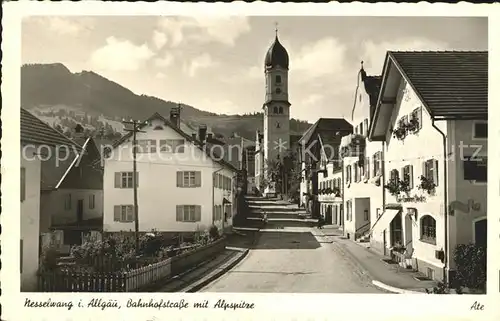 Nesselwang Bahnhofstrasse mit Kirche und Alpspitze Kat. Nesselwang