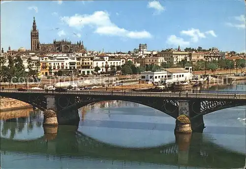 Sevilla Andalucia Puerto de Triana y vista parcial Catedral Kat. Sevilla 