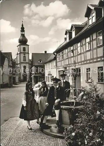 Gersfeld Rhoen Trachtengruppe am Brunnen Kirche Kat. Gersfeld (Rhoen)