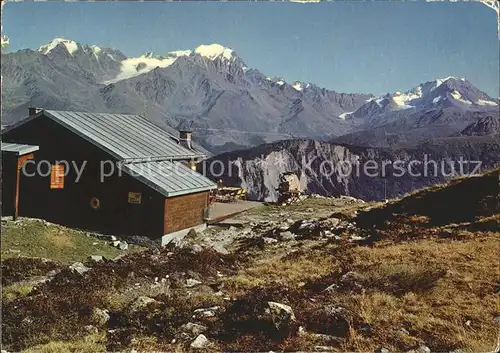 Champex Restaurant de la Breyaz au fond le Gd Combin et le Velan Kat. Champex