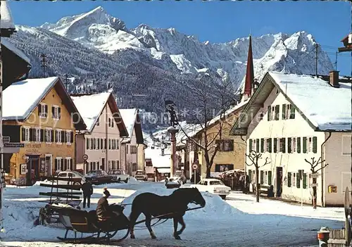 Garmisch Partenkirchen Floriansplatz mit Zugspitzgruppe Pferdeschlitten Kat. Garmisch Partenkirchen