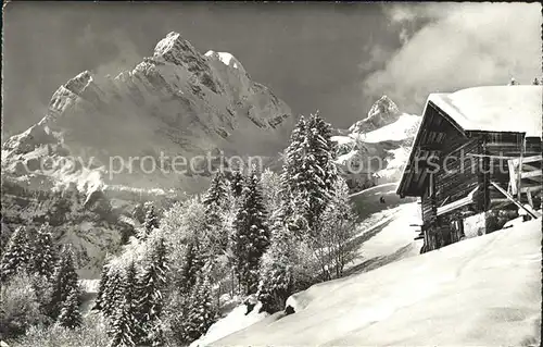 Braunwald GL Berghuette Winterpanorama mit Ortstock und Hoher Turm Kat. Braunwald