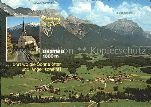 Obsteig Tirol mit Mieminger Kette und Hohe Munde Dorfkirche Fliegeraufnahme Kat. Obsteig
