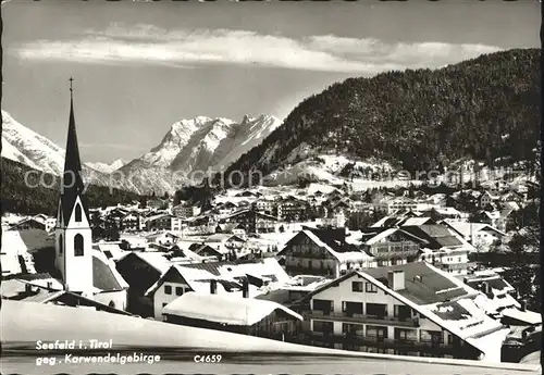 Seefeld Tirol Ortsansicht mit Kirche gegen Karwendelgebirge Kat. Seefeld in Tirol