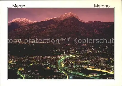 Merano Suedtirol Fliegeraufnahme am Abend Kat. Merano