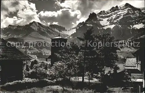 Adelboden Kirche mit Bonderspitz und Nuenihorn Berner Alpen Kat. Adelboden