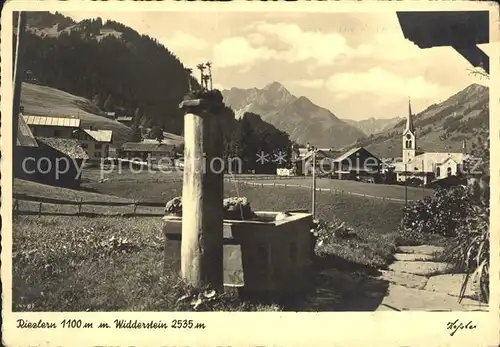 Riezlern Kleinwalsertal Vorarlberg mit Widderstein Brunnen Kirche Kat. Mittelberg
