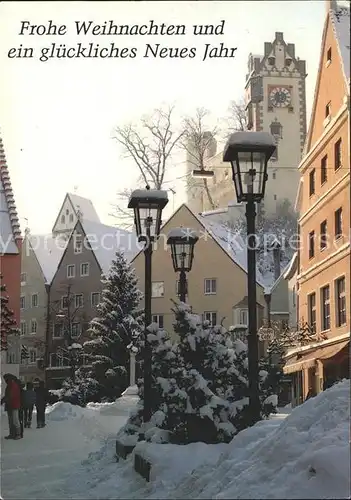 Fuessen Allgaeu Fussgaengerzone im Schnee mit Hohes Schloss und St Mang Kirche Kat. Fuessen