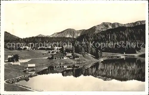 Davosersee mit Wolfgang udn Raetikonkette Kat. Davos