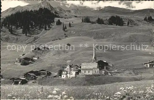 St Antoenien GR Dorfansicht mit Kirche und Aelpli Bergwiese Kat. St Antoenien