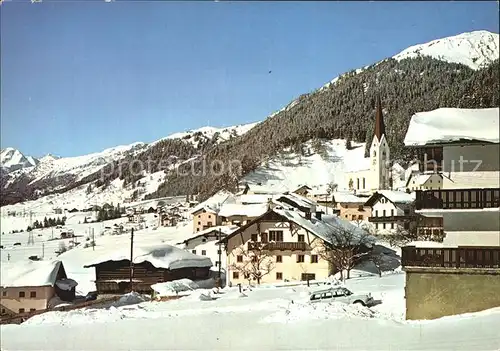 St Jakob Arlberg Ortsansicht mit Kirche im Winter Kat. St. Anton am Arlberg