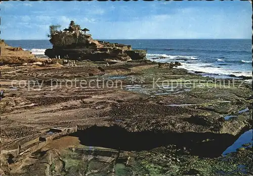 Pantai Tanahlot Coastal scene at low tide