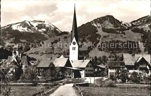 Fischen Allgaeu mit Kirche Wannenkopf und Bolsterlangerhorn Kat. Fischen i.Allgaeu