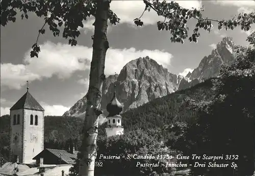 Innichen Suedtirol Kirche Drei Schuster Spitze Dolomiten Cime Tre Scarperi Kat. Innichen Pustertal