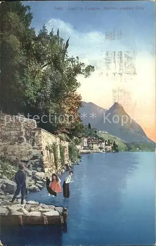 Oria Lago di Lugano Kinder und Haeuser am See / Lugano /Bz. Lugano City