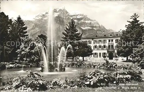 Glarus GL Hotel Glarnerhof mit Volksgarten Fontaene und Wiggis Kat. Glarus