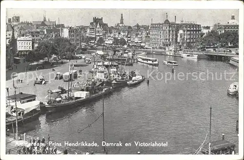 Amsterdam Niederlande Prins Hendrikkade Damrak en Victoriahotel Schiff Kat. Amsterdam