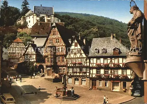 Miltenberg Main Marktplatz mit Blick zur Burg Brunnen Skulptur Fachwerkhaeuser Kat. Miltenberg