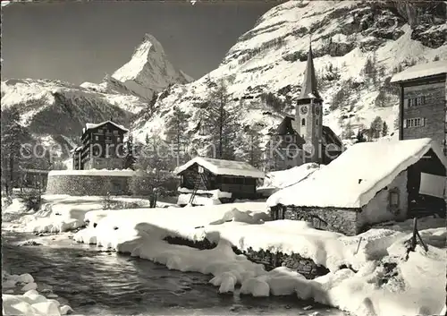 Zermatt VS Partie am Bach Kirche Winterpanorama Matterhorn Walliser Alpen Kat. Zermatt
