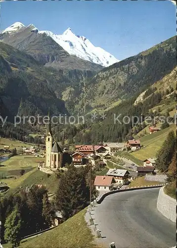 Heiligenblut Kaernten Teilansicht mit Grossklockner und Kirche Kat. Heiligenblut