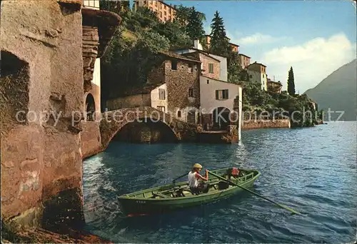 Nesso Lago di Como Haeuserpartie am Comersee Boot Kat. Italien