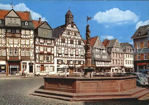 Butzbach Marktplatz mit ehem Gasthof Goldener Loewe und Rathaus Brunnen Kat. Butzbach