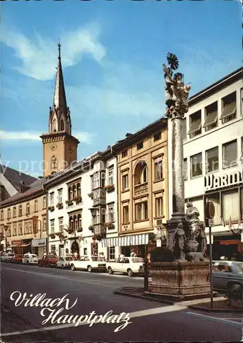 Villach Kaernten Hauptplatz mit Dreifaltigkeitssaeule und Stadtpfarrkirche Kat. Villach