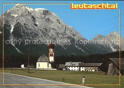 Leutasch Kirchplatz mit Hohe Munde Kat. Leutasch Tirol