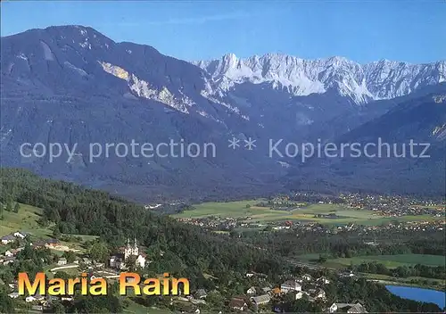 Maria Rain Kaernten Panorama Wallfahrtsort gegen Ferlach und Koschuta Bergmassiv Karawanken