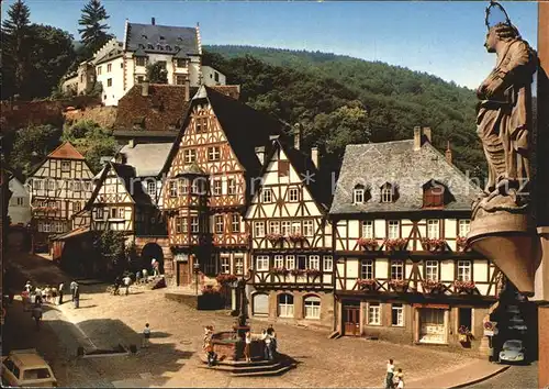 Miltenberg Main Marktplatz mit Blick zur Burg Brunnen Fachwerkhaeuser Kat. Miltenberg