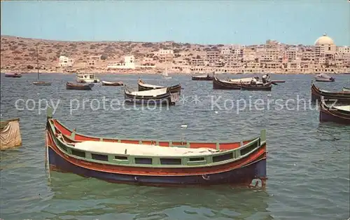 Malta St Pauls Bay with Luzzu fishing boats at anchor Kat. Malta