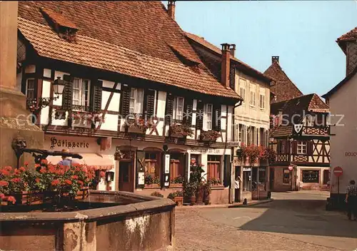 Ribeauville Haut Rhin Elsass Brunnen und Alte Haeuser mit Blumenschmuck Kat. Ribeauville