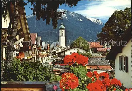 Garmisch Partenkirchen Sonnenstrasse mit Pfarrkirche St. Martin Kat. Garmisch Partenkirchen